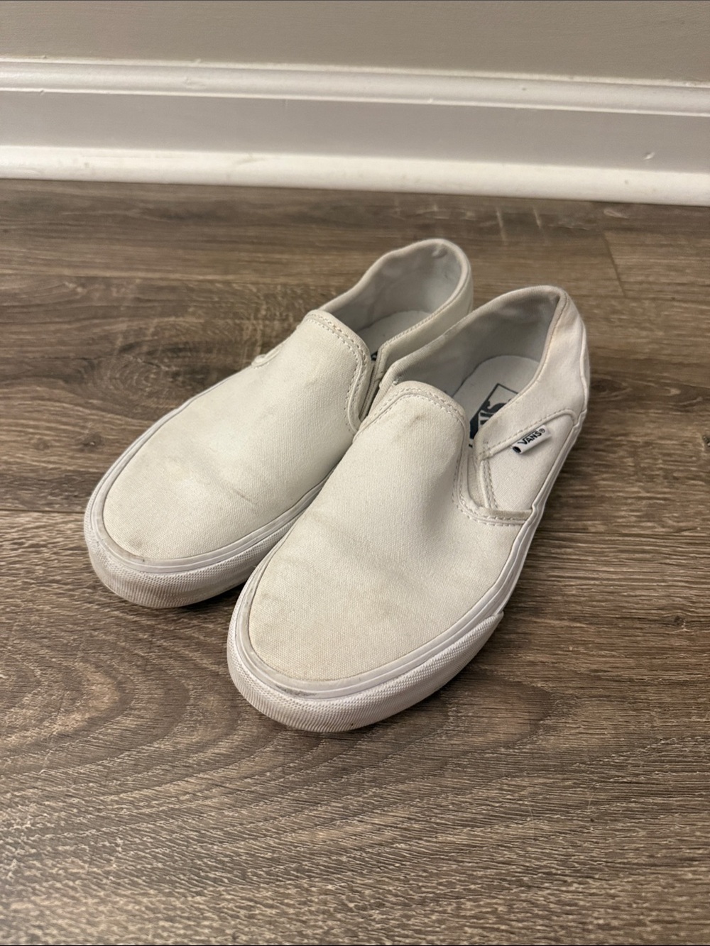 Vans White Canvas Slip-Ons